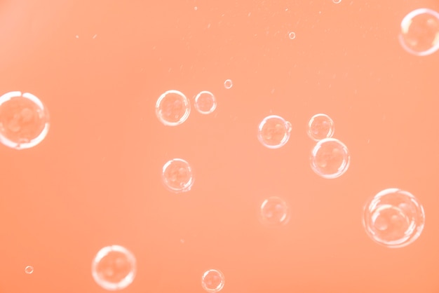 Transparent bubbles over colored background