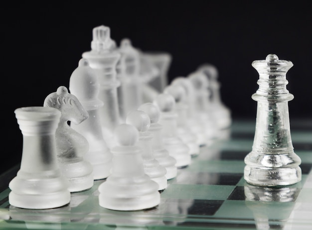 Transparent chess pieces on board