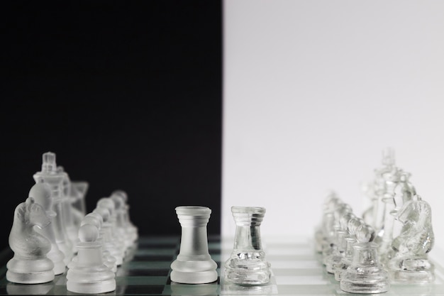 Transparent chess pieces on board