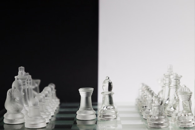 Free photo transparent chess pieces on board