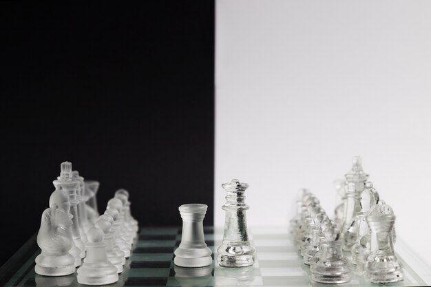 Transparent chess pieces on board