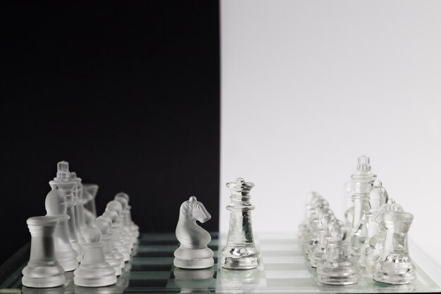 Transparent chess pieces on board