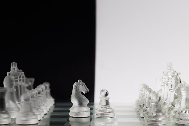 Transparent chess pieces on board