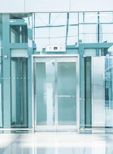 Free photo transparent elevator in underground passage