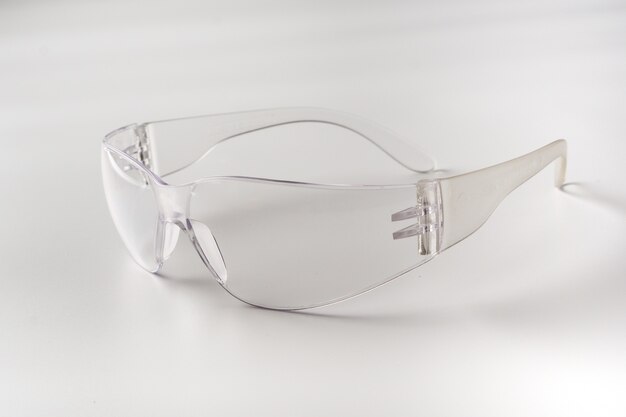 Transparent glasses for laboratory purposes on white