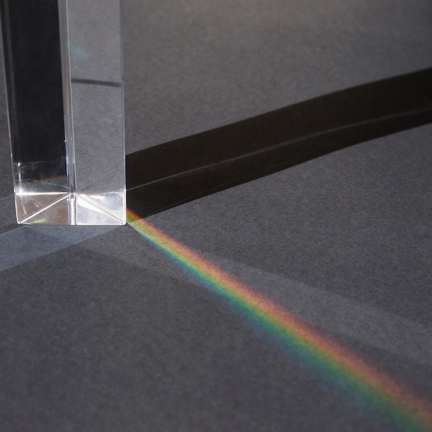 Free photo transparent prism with rainbow