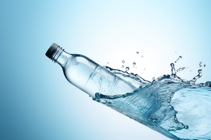 Free Photo transparent water bottle in studio