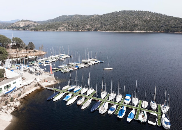 Free photo transport concept with boats in harbor aerial view