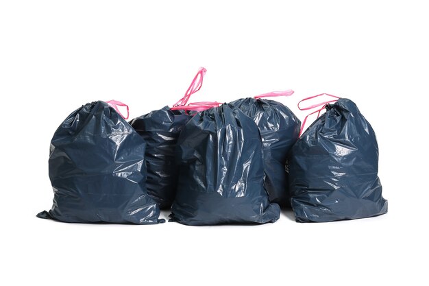 green garbage bag with concept the color of green garbage bags is  biodegradable compostable waste (isolated on white background) Stock Photo