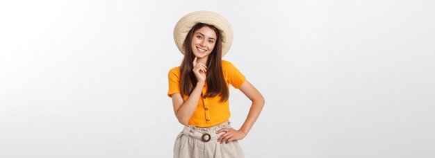 Travel concept close up portrait young beautiful attractive girl wtih trendy hat and smiling white b