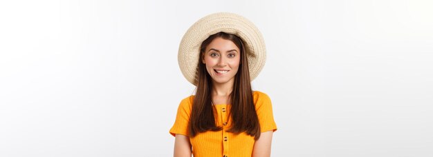 Travel concept close up portrait young beautiful attractive girl wtih trendy hat and smiling white b