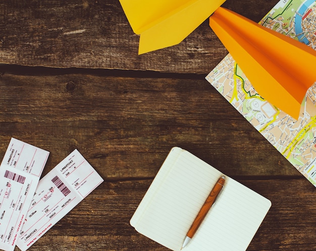 Travel concept. Objects on wooden background