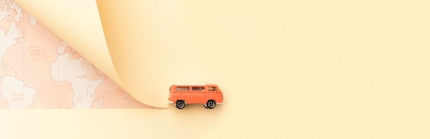 Travel concept with map and toy van