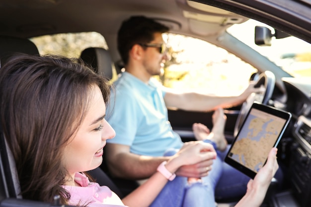 Travel. Couple is traveling in the car