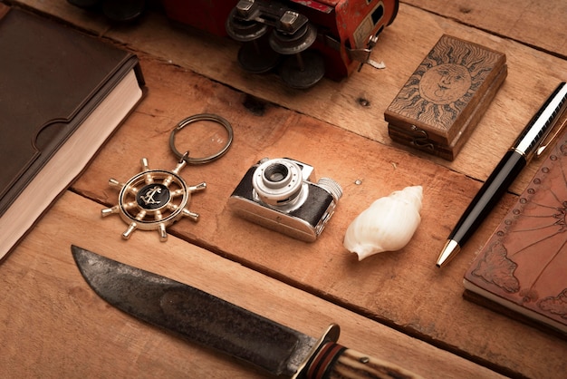 Travel items on wooden table