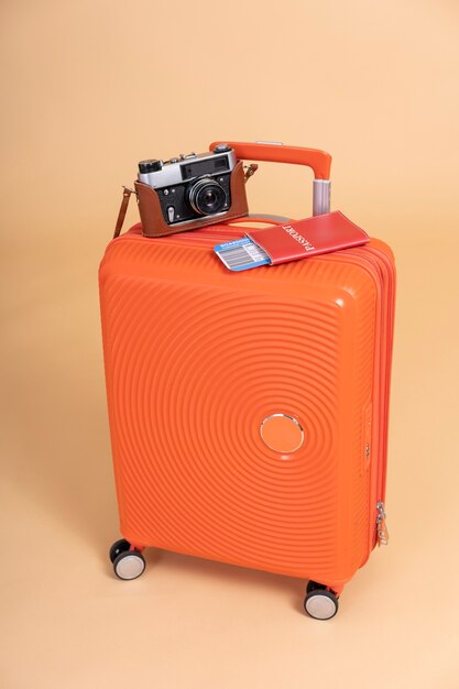 travel luggage with camera and passport