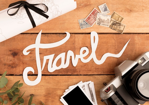 Travel photos with postage on wooden table