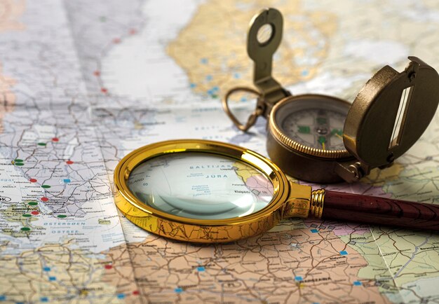 Travel set with compass on map