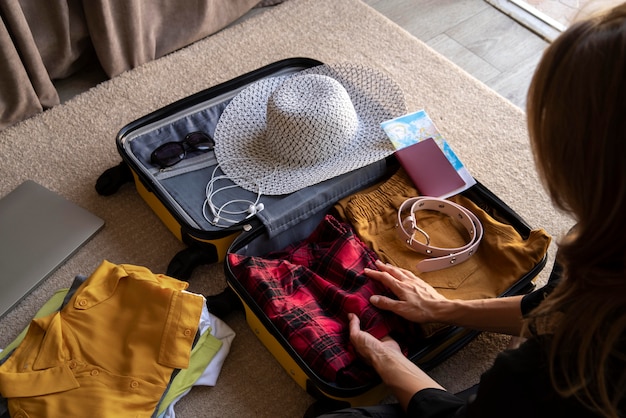 Free photo travel suitcase and preparations packing