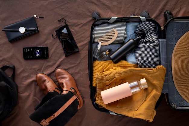 Free photo travel suitcase and preparations packing