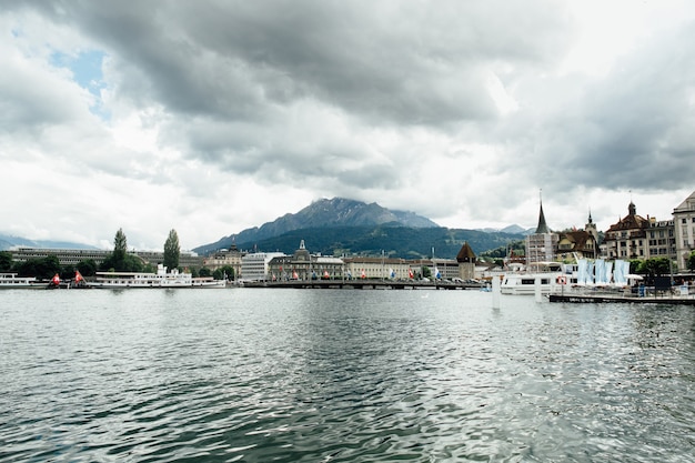 Travel in Switzerland. Beautiful view on lake in Lucerne, city and mountain. Tourism