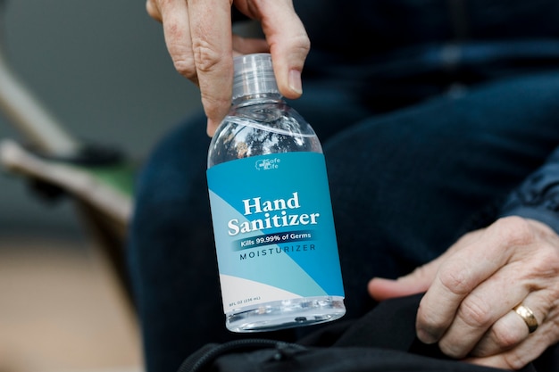 Free photo travel with hand sanitizer traveling in the new normal