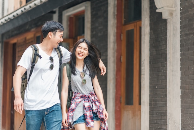 Traveler Asian backpacker couple feeling happy traveling in Beijing, China