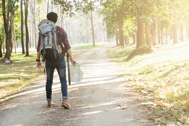 Traveler with backpack relaxing outdoor.