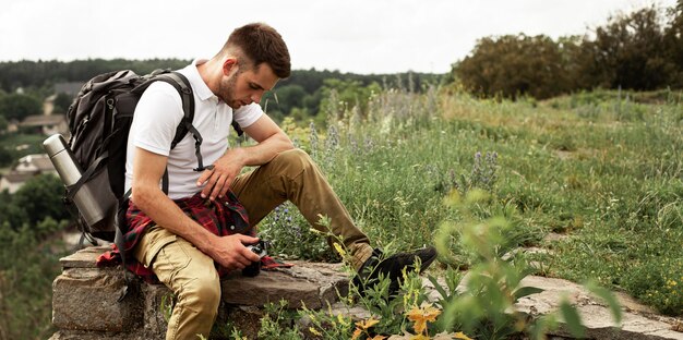 Traveler with backpack resting