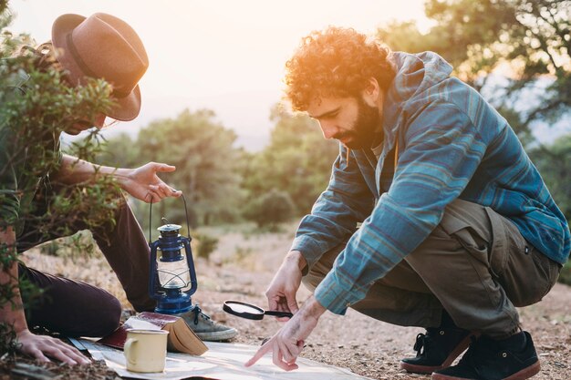 Travelers reading map