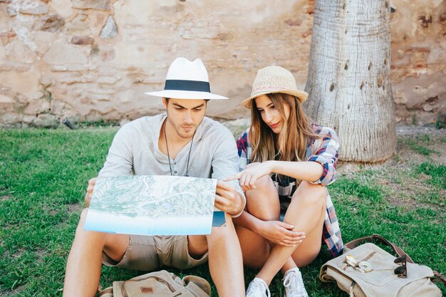 Travelers resting on the grass