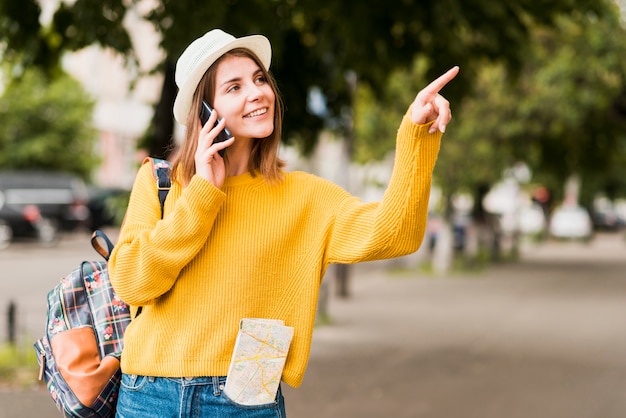 Travelling woman talking on the phone