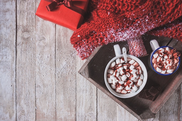 Tray with cups with marshmallows