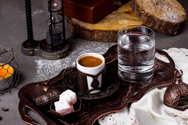 Free Photo tray with hot turkish coffee water and lokum