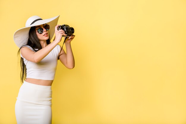 Trendy female taking photo