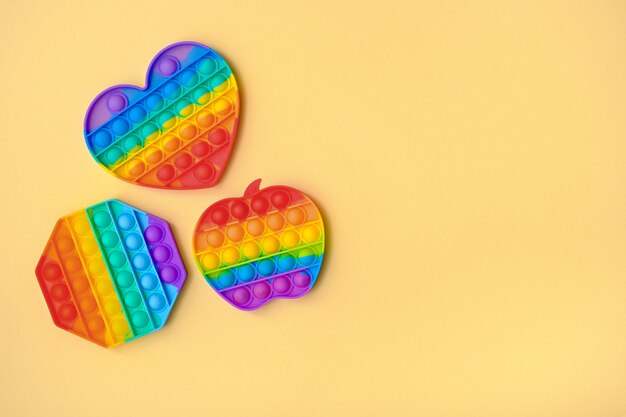 Premium Photo Pattern Trendy Pop It Fidget Toy On Blue Background For Design Premium Photo Pattern Trendy Pop It Fidget Toy On Blue Background For Design
