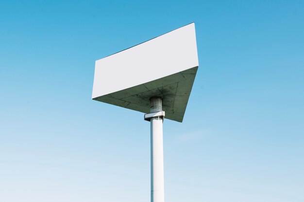 Triangle billboard on background of blue sky