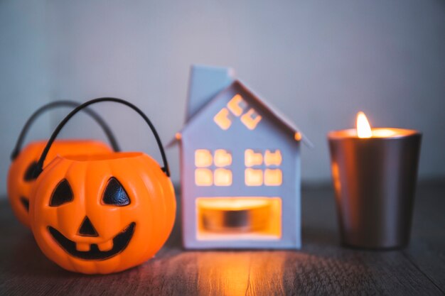 Trick or treat baskets near candles