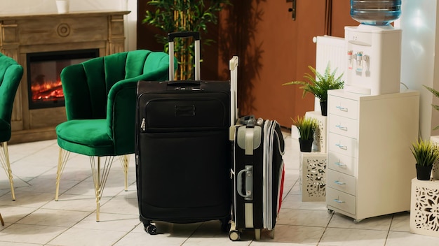 Free photo trolley bags baggage in hotel reception and lounge area, clients luggage and modern decorations at resort front desk. luxurious furniture at hotel reception entrance, registration.