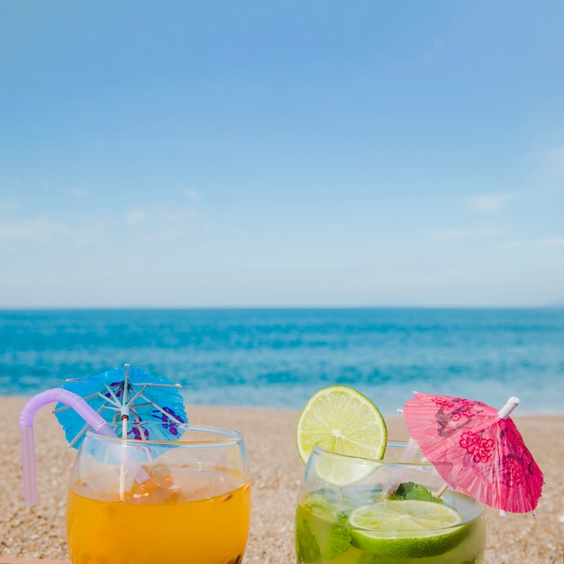 Tropical cocktails on background of ocean