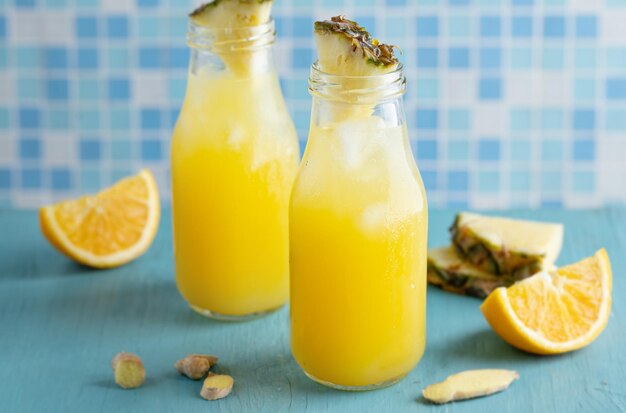 Tropical fruity drink with pineapple and orange