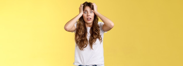 Free photo troubled concerned anxious panicking woman female employee lose control grab head nervously stare