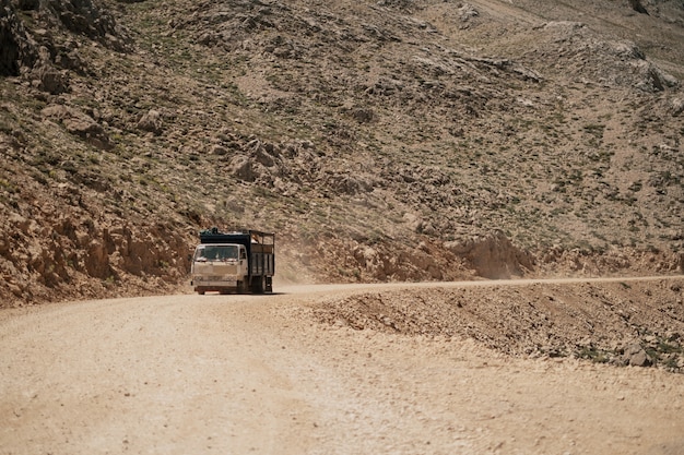 Truck driving on mountain road