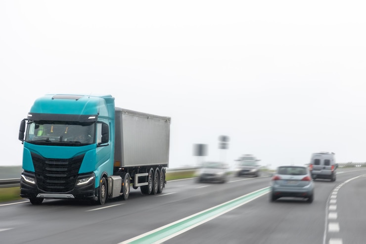 Free Photo truck on highway heavy vehicle in motion road logistics scene