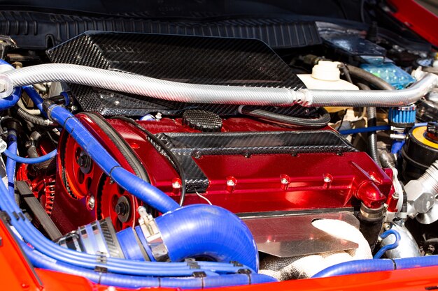 Turbocharged engine on a sports car, close-up under the hood