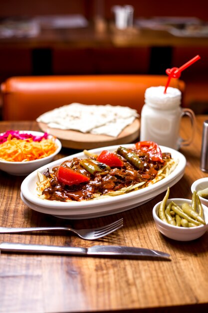 Turkish beef kebab served on top of potato