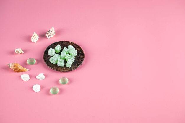 Turkish delight lokum in a metallic saucer with candies