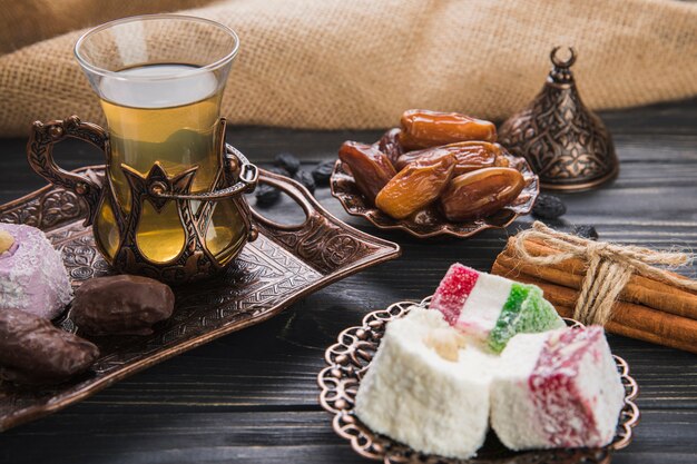 Turkish delight with tea and dates fruit 