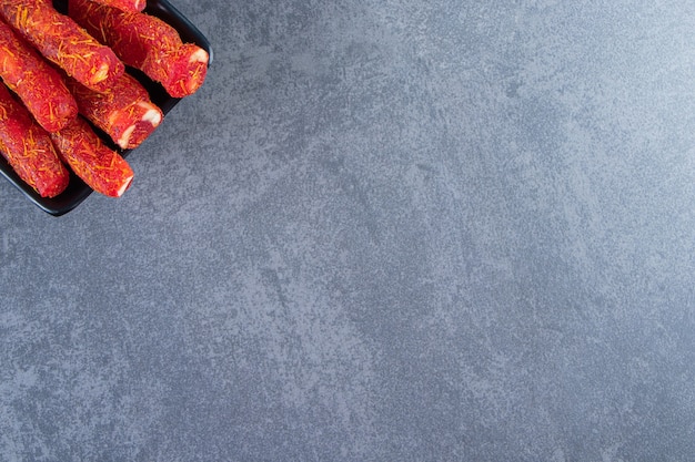 Turkish delights on a bowl , on the marble background