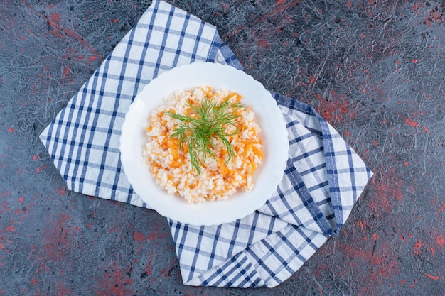 Free photo turkish menemen with herbs in a white plate.